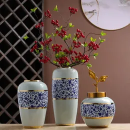 Vaser blå och vit keramisk bänkskiva vas torkad blommor arrangemang gyllene stroke vardagsrum dekoration modern