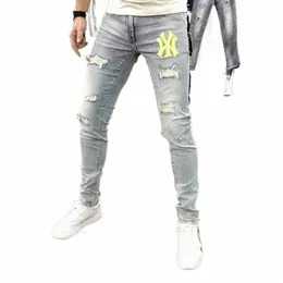 Męskie dżinsy hip hopowe watme elastyczne rozryte chude dżinsy Wysokiej jakości młodzież jasnoniebieskie spodnie Slim Streetwear Mans Denim Spodni E4ao#