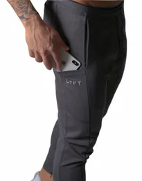 Y Brand Мужские спортивные штаны Беговые спортивные штаны для бега Мужские брюки Спортивный костюм Спортивные штаны Fitn Бодибилдинг Мужские брюки H5OQ #