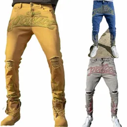 Nya ankomster mäns smala rippade jeans högkvalitativa diamd dekorati street fi casual byxor stilfulla punk jeans män; Z8fs#