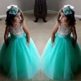 Söt turkos gröna blomma flickor klänningar spaghetti födelsedagsklänningar remmar kristall pärlstav tyll småbarn tävlingsklänningar för flickor240r