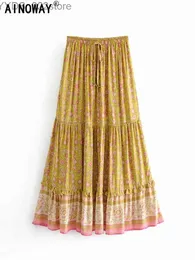 Spódnice skortają Vintage Chic moda hipisowskie kobiety bohemian żółta kwiatowa druk spódnica wysoka elastyczna talia A-line boho maxi femme yq240328