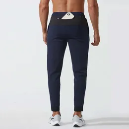 Lu Align Зимние мужские осенние брюки LU Мужские брюки для бега Тренажерный зал Спортивные тренировки с низкой талией и карманами Брюки для бодибилдинга Баскетбольные беговые брюки Lemon Sports 2024