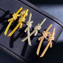ノットシリーズゴールドイヤリングデザイナー女性のためのダイヤモンドイヤリング18kゴールドメッキバタフライノットイヤリング高品質のデザイナージュエリーマザーギフト