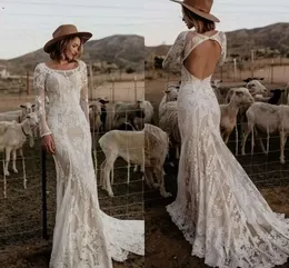 Nowoczesne długie rękawie boho country Hippie gotyckie sukienki ślubne syrena koronkowe aplikacje Sukie szyi skiewki ślubne szaty