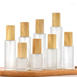 Butelki do przechowywania 20/30/50/80/100/120 ml drewniane szklane szklane szklane spraym balsam do sprayer płynna płynna mgła napełona drewniana czapka perfumy