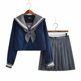 Preppy Style JK Uniform Set Navy Blue Top With Sakura broderied Mönster grå veckade kjolflickor Sailor Suits Lg Sleeved G6ef#