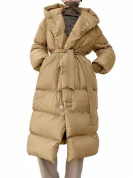 2023 Nya överdimensionerade huva Winter Puffer Jacket Kvinnor Solid tjock varm SES -bindning Vit Duck ner över knärocken C0IK#