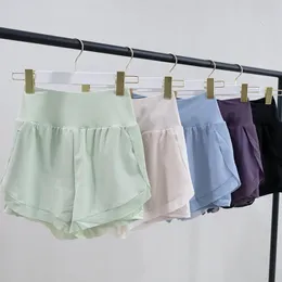 Esportes secagem rápida shorts verão malha combinando calças de perna larga das mulheres anti yoga elástico outerwear 240106