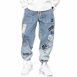 primavera autunno stampa lettera jeans larghi Carto Graffiti pantaloni con coulisse tendenza Hip Hop casual streetwear pantaloni da jogging f8u0 #