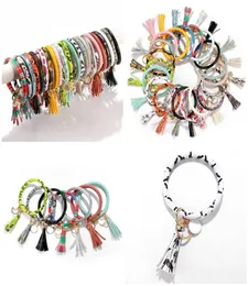 21 Styles of Creative PU Leather Bracelet Key Chain Round Piece Pendant Women039s Leather Bracelet DHB4528549025