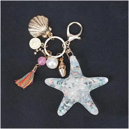 Nyckelringar Starfish Car Keychains for Girls Women Bag smycken Tillbehör Tassel Conch Shell Pearl Pendant Sea Animal Metal Keyring Dro Dhzhc