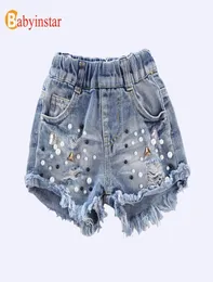 Babyinstar jeans 2020 verão crianças cowboy pérola buraco roupas meninas shorts jeans y2007049173249