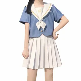 Mulheres Estilo Japonês Uniforme Escolar Fi New Navy Neck Branco Arco Manga Curta Azul Jk Tops Cor Sólida Saia Plissada Ternos T5eq #