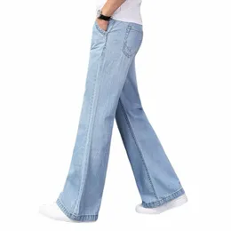 Gratis fartyg Nya män 2023 Summer Thin Light Weight Wide-Ben Staka jeans Big Size Busin Casual Flare Pants Black Blue K0AA#