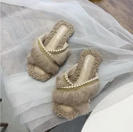Hausschuhe Frauen Plüsch Slipper neue Mode flachen Boden Wort Drag Indoor Hause Winter Perle flauschige Hausschuhe
