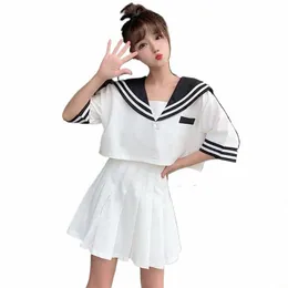 10代の少女のための日本の船乗りの襟のユニフォームカワイイトップシャツプリーツスカートセクシーな韓国の学校の服、2ピースセットパーティーD421＃
