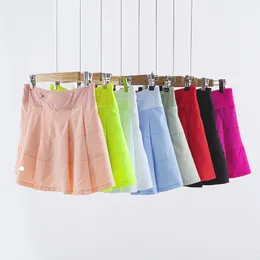 Lu Women Sports Yoga Gonfie Shorts Shorts Solid Color LL Gonne da golf da tennis Anti Exposure Fitness Short Short Skirt S604