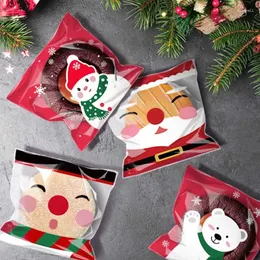 ギフトラップ100pcsクリスマスバッグキャンディークッキー自己粘着パッケージビスケットスナックベーキングバッグナビダッドイヤーパーティークリスマスサプライ