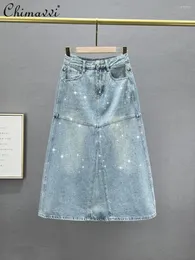 تنورات التنانير A- Line Denim Skirt for Women 2024 Spring Summer Fashion High Weist Lorder Seriting Europeance Progds Rhinestone Midi