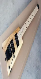 Chitarra elettrica senza testa di colore naturale personalizzata in fabbrica con hardware nero Tastiera in palissandro Tremolo che offre servizi personalizzati6514073