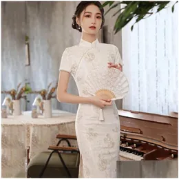 Abbigliamento etnico Classico Elegante Bianco Femminile Qipao Vintgae Colletto alla coreana Fiore di pizzo Cheongsam Y Split Abiti Tradizionale Goccia Del Otcrz