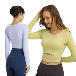 T Shirt 2024 LU ALIGN WOMIN'S TOPS TOPS CHEST PAD مكشوفة اليوغا الرياضية الرياضية الليمون Lemon Long-Sleeved Fiess T-Shirt جوارب ركوب الدراجات في الهواء الطلق Lemons Ops-Eights S