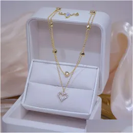 Ожерелья с подвесками, женская цепочка на ключицы, элегантное очаровательное свадебное ожерелье золотого цвета, двухслойное сердце, блестящее Bling Aaa, ювелирные изделия из циркона D Dhcj9