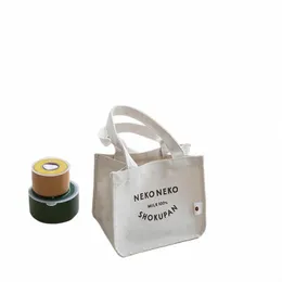 Bento Tasche 2024 Neue Damen Kleine Tasche High End Fiable Canvas Tasche Handheld Ausgehende Lunchbox Handtasche T78D #
