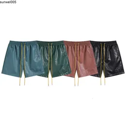 Projektanci szorty dobrze się sprzedają. Autumn Nowa marka modowa RH American Hafted Letter Leather Shorts for Women Pu Split Men