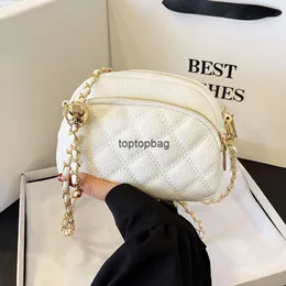 Designer Luxury Fashion Tygväskor Högkvalitativ liten väska för kvinnor 2024 Ny koreansk version Fashionable Diamond Grid Chain Single Shoulder Crossbody Väska mångsidig SM