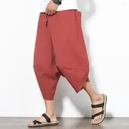 Calças masculinas Homens de verão solto de comprimento médio multi bolsos de cor pura estilo japonês