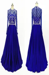 Fantastisk Royal Blue Long Sleeve Pageant Prom -klänningar 2022 High Neck Illusion Crystal Pärled Sequin A Line Satin Hollow Back Evenin7744110