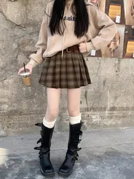 Skirts American Retry Skirt Plaid per il colore autunno e inverno del caffè invernale A-Line Short JK College Style