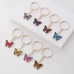 Keecheins 8pcs Boho Butterfly Keetchain Cute Summer Animal Key Chain Angh Borse Borse Borse Charm Case Cover Accessori per ragazze Regali per ragazze