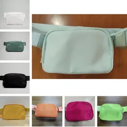 Najlepiej sprzedający się nylonowe wodoodporne na zewnątrz solidne kolorowe torby w talii torba na fitness Crossbody Bag Dogodna dla mężczyzn i kobiet do noszenia torbów z telefonu komórkowego na siłowni
