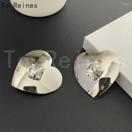 Ryggar örhängen till Reines 2024 berömda designermärken Crystal Heart Big Ear Clip Women Europa Pendientes Jewelry Party Gift