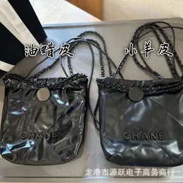 bolsa de grife bolsa de bolsa primavera/verão temperamento preto diamante cross body saco popular preto22bag mini lixo óleo cera de cera de luxo canalizações garoto woc woc moderno