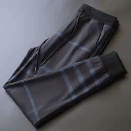 Pantalone pantaloni pantaloni da uomo uomini da donna joggers pantalones moda hip hop streetwear elastic waist pantaloni lunghi controlli di stampa asiatica di dimensioni asiatiche m-4xl