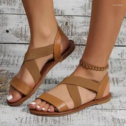 Sapatos casuais 2024 Verão Europeu Femme Sandals planas tiras elásticas femininas Roman Beach Aberto do pé