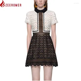 Festklänningar högkvalitativ svart vit lapptäcke självporträtt klänning 2024 Runway Summer Short Sleeve Hollow Out Women Lapel Collar