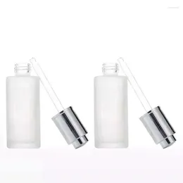 저장 병 10pcs Frost Glass Essence Ements Refill Bottle Silver Press Dropper 뚜껑 20ml-100ml 빈 화장품 에센셜 오일 피펫
