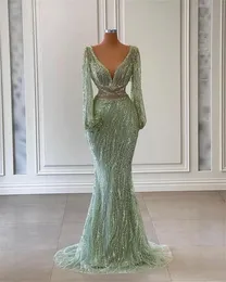 Sexy Mermaid Prom Dresses Sexy Deep V Neck Long Sleeves Sequins Appliques Beads Hollow Lace Shiny Floor Length Plus Size Formal Party Gowns Custom Made