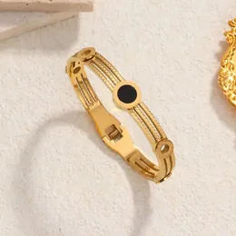 Bangle Женский роскошный браслет из черного круга изысканный золотоизвестный изысканный золото.