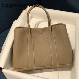 Designer Garden Party Bags Bag Lychee Grain Leather Womens stor kapacitet hink en axelhand genomför tote har logotyp KSJD