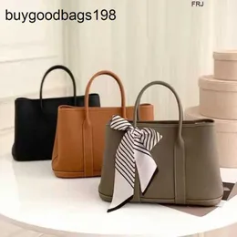 Designer Garden Party Bags in pelle portatile Tote femmina Bride Cowhide Commutatore di grande capacità versatile una spalla Crossbody ha un logo