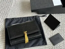 2024 Versão de couro de vaca nova moda Tassel Flip Crossbody Bag Women's Mini -Chain Bolsa Bolsa Luxury Designer casual Small Square Bag Wallet Syncronization