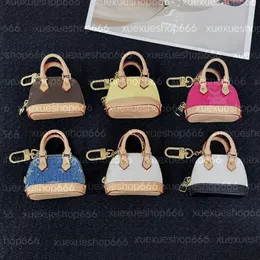 Bolsas de luxo Mulheres Chave da carteira de carteira Micro bolsa bolsa com calchain moeda bolsas Ladies mini moedas bolsas de shell bolsas de casca masculas bolsas de gabinetes pendentes de chaveiro pendente