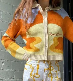 Kadınlar Sonbahar Vintage Fransız Tarzı Güneş Işığı Baskı Kısa Örme Sweater Chic Lady Fashion Single Bravatalı Gevşek Harks Femme LJ29781670