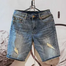 Men's Jeans Summer fashion mens hole denim shorts new blue pocket shorts mens jeans pantsL2405